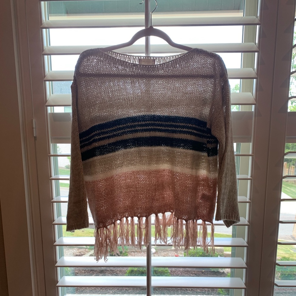 Cute fringe sweater!